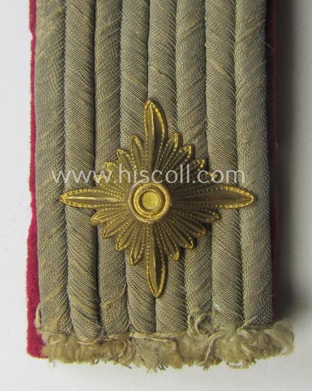 Single, Waffen-SS officers'-pattern shoulderboard as piped in the bordeaux-coloured branchcolour: 'SS-Obersturmführer der Nebelwerfer-Trpn.'