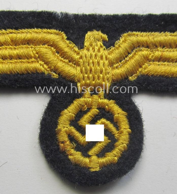 Attractive, WH (KM) EM ie. NCO-type, machine-embroidered visor-cap-eagle as executed in yellow-coloured linnen as intended for usage on the various naval, EM- ie. NCO-pattern visor-caps