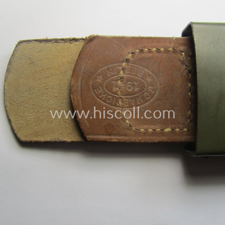 Stunning, WH (Heeres) field-grey-coloured- and/or steel-based belt-buckle, being a maker- (ie. 'J. C. Maedicke'-) marked- and/or: '1941'-dated example on its leather-based tab and that comes in a stonemint- ie. unissued-, condition
