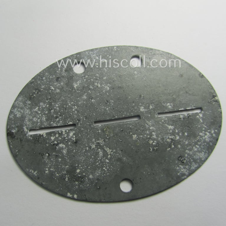 Zinc-based, WH (Luftwaffe) ie. 'Hermann Göring-Division'-related ID-disc, bearing the stamped unit-designation: 'Stabs.Kp./Ers.u. Ausb.Rgt.H.G.' and that comes as issued and/or clearly worn