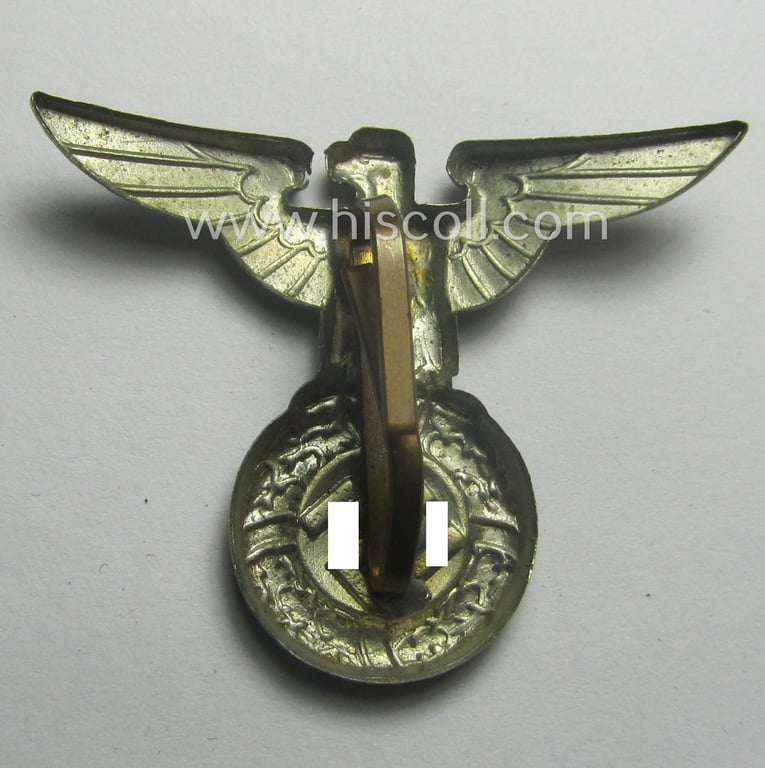 Silver-toned - and 'Buntmetall'-based - early-pattern, SS- o. SA-type, political visor- (ie. 'Schirmmützen'-) cap- (ie. 'Kepi'-) eagle being a non-maker-marked example that comes in a used- ie. carefully cap-removed, condition