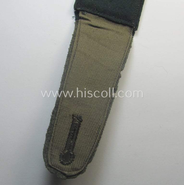 Single, WH (Heeres) EM-type 'cyphered' shoulderstrap: 'Soldat des Artillerie-Rgts. 99'