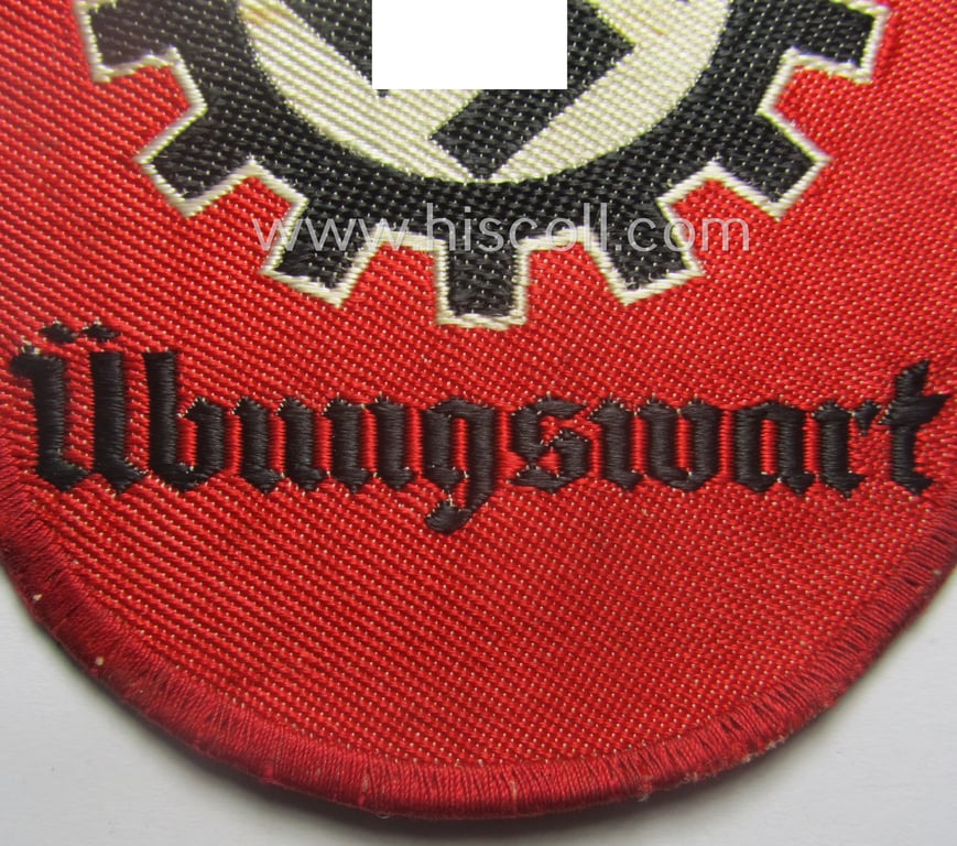 D.A.F.- (ie. 'Deutsches Arbeitsfront') specialist-armbadge (ie. 'Tätigkeitsabzeichen') as executed in neat 'BeVo'-weave pattern as was intended for a: 'D.A.F.-Übungswart'