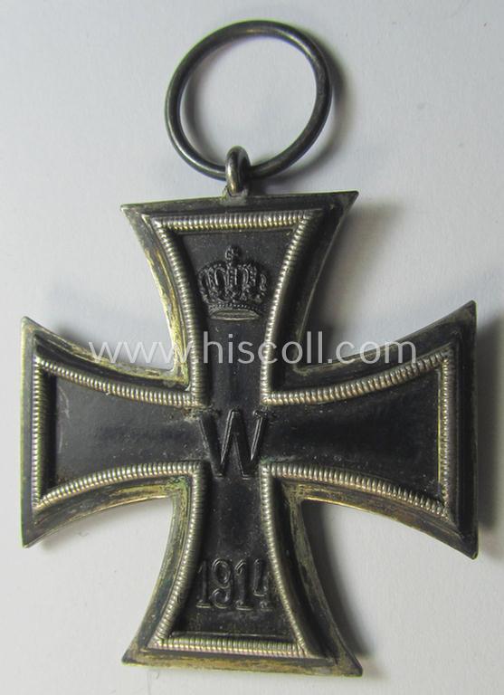 Attractive, WWI-period: 'Eisernes Kreuz II. Klasse' (or: iron cross second class) being a clearly maker- (ie. 'KO'-) marked example that comes together with its (minimally) confectioned piece of ribbon (ie. 'Bandabschnitt')