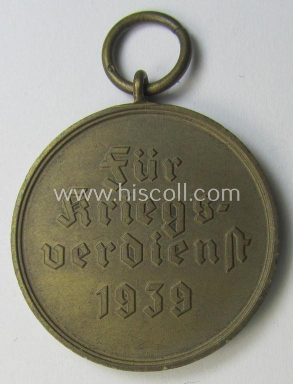 Neat, 'Kriegsverdienstmedaille 1939' being a non-maker-marked- (and/or: 'Buntmetall'-based) specimen that came together with its full-length (bright-red-coloured) ribbon (ie. 'Bandabschnitt')