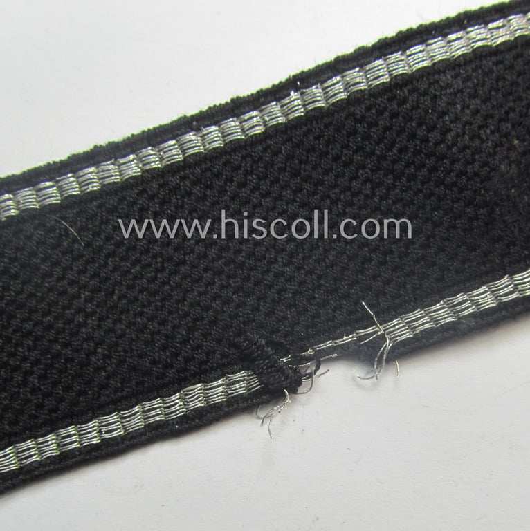 Moderately used- and/or worn Waffen-SS, 'RzM'-pattern, EM- (ie. NCO-) type cuff-title (ie. 'Ärmelstreifen') as was intended for a member of the: 5. SS-Panzer-Division "Wiking"