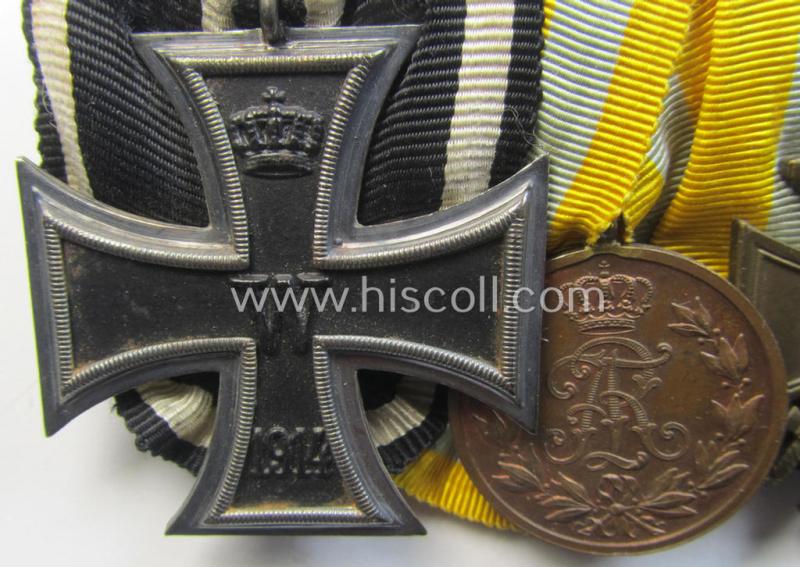 Attractive, 4-pieced WWI-period, medal-bar (ie. 'Ordenspange') resp. showing an: 'EK II.Kl', a: Sachsen 'Friedrich August'-medal, an: 'FKK 1914-18 mit Schw.' and a: 'Kyfhaüsserbund' commemorative-medal
