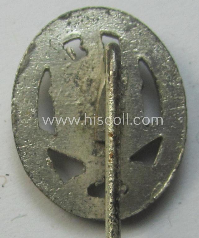 Miniature-lapel-pin depicting an: 'Allgemeines-Sturmabzeichen' (or: general-assault-badge ie. GAB) being a non-maker-marked example as executed in silver-coloured zinc-based metal (ie. 'Feinzink')