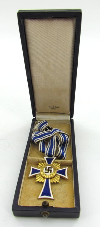 Mother’s cross in gold with box ( Ochs & Bonn Hanau )