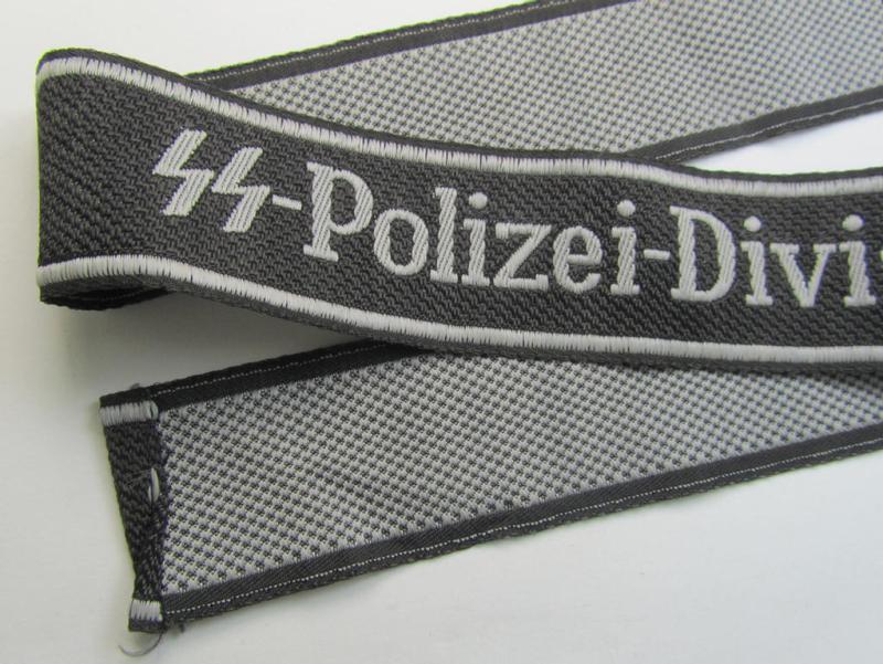 Superb, Waffen-SS 1943/44-pattern cuff-title (ie. 'Ärmelstreifen') as was intended for a member serving within the  the: '4. SS-Polizei-Panzergrenadier-Division' (ie. 'SS-Polizei-Division')
