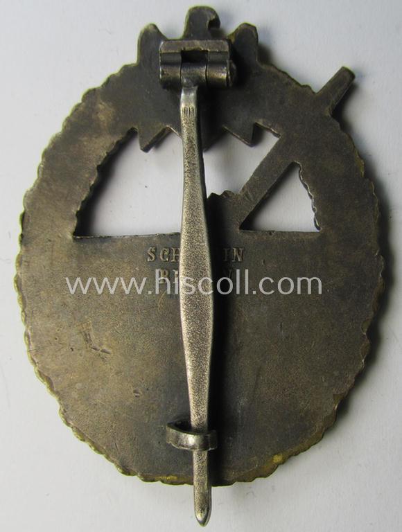 Superb - albeit moderately used but rarely seen! - WH (Kriegsmarine) 'Marine-Artillerie-Abzeichen' being a typical maker- (ie. 'Schwerin-Berlin'-) marked- and/or: 'Buntmetall'-based example as was produced by the desirable: 'Schwerin'-company