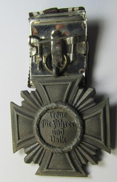 Attractive - and not that easily found! - 'N.S.D.A.P. Dienstauszeichnung in Bronze' (ie. '3. Stufe für 10 Jahre t.D.') being a 'thinner-shaped'-pattern, zinc- (ie. 'Feinzink'-) based example that comes mounted onto a so-called: 'Einzelspange...