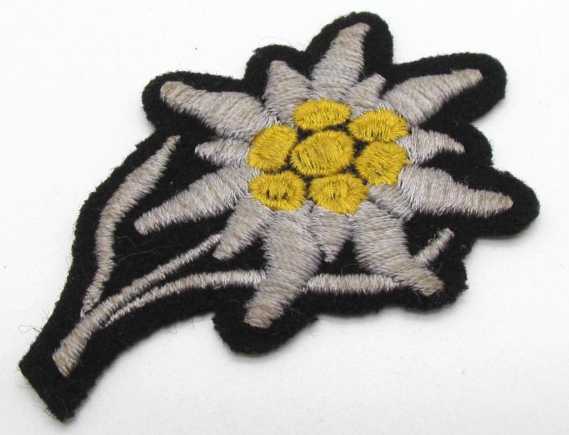 Waffen SS 'Gebirgsjäger' Edelweiss cloth cap badge