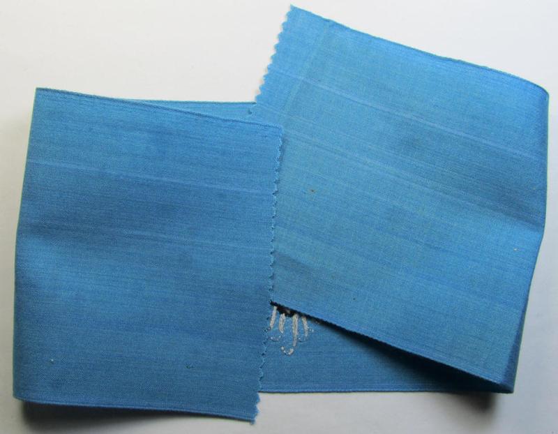 Superb, light-blue-coloured, so-called: RLB (or: 'Reichsluftschutzbund') 'Amtsträger'-armband depicting the typical 'RLB'-logo (without lettering) and that is void of an interwoven makers'-designation