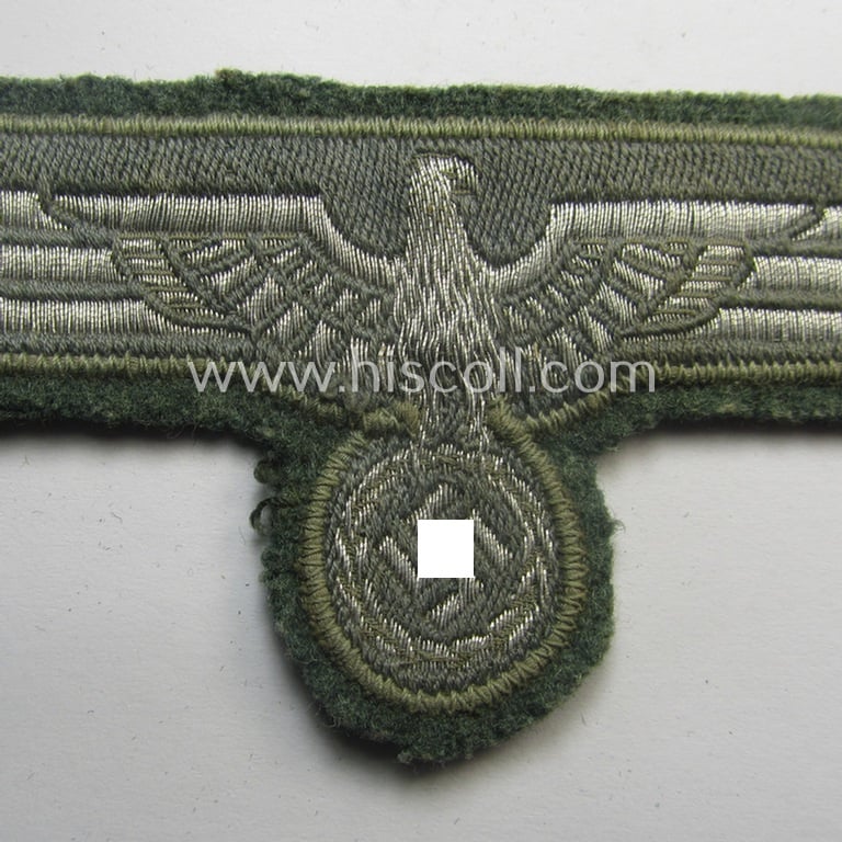 WH (Heeres) breast-eagle as executed in 'BeVo'-type-, so-called: 'flat-wire'-weave-pattern and pre-mounted on field-grey-coloured wool as was specifically intended for usage by soldiers (ie. NCOs) on their dress-tunics (ie. 'Waffenröcke')