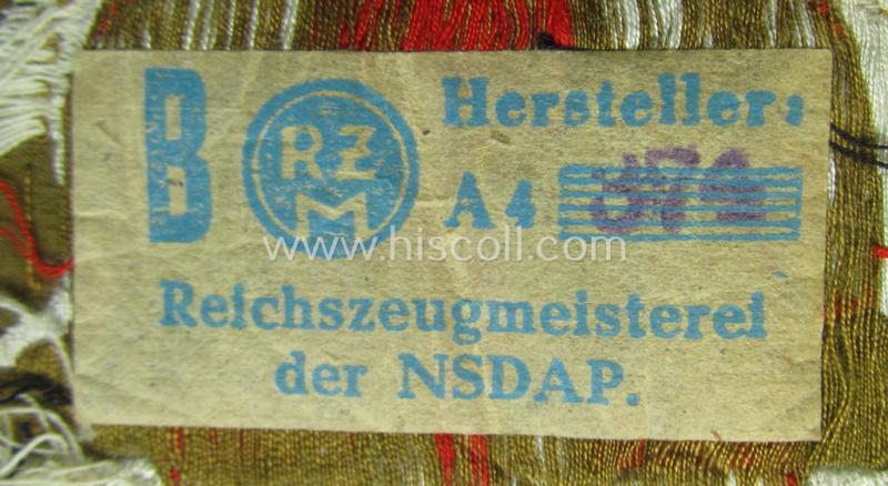 Superb - and rarely encountered! - breast-badge as executed in 'BeVo-weave' pattern as was intended for members within the 'N.S.D.A.P. Reichsautozug' (or: 'RaZ') still retaining its period, paper-based 'RzM'-etiket