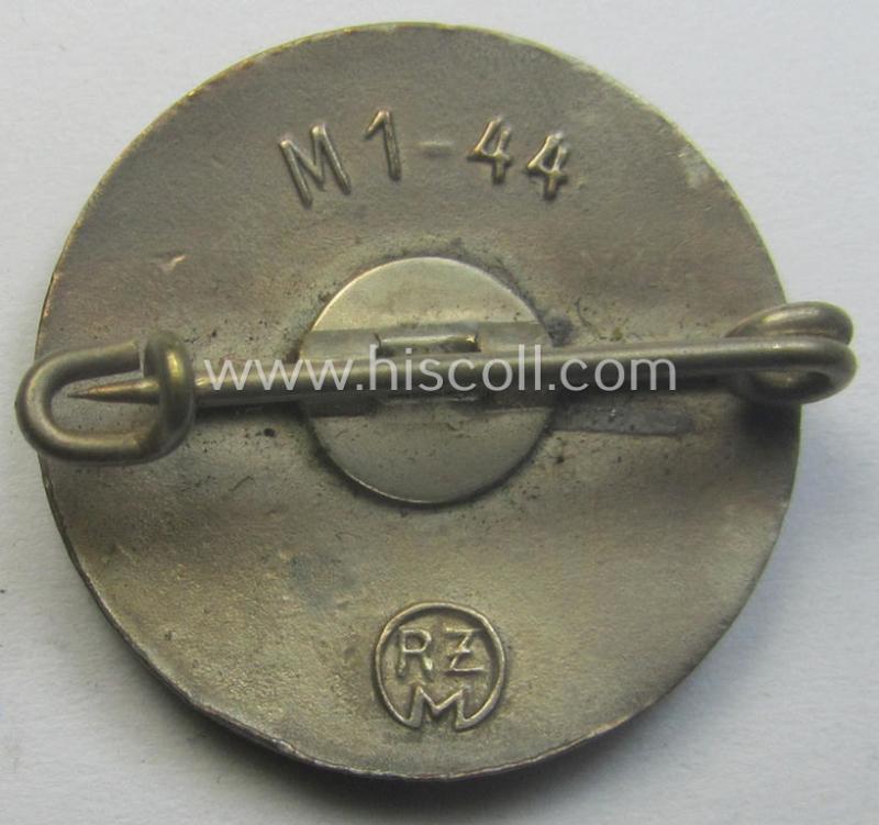 'N.S.D.A.P. - Parteiabzeichen' showing the makers'-designation: 'RzM' and/or: 'M1-44'