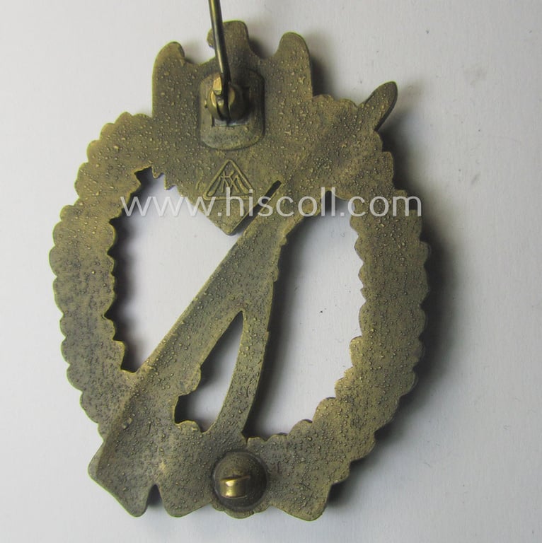 Superb, 'Infanterie Sturmabzeichen in Bronze' being a maker- (ie. 'MK' in a triangle-) marked (and/or minimally converse- ie. vaulted-) example by a to date still unidentified maker as was executed in golden-bronze-toned 'Feinzink'