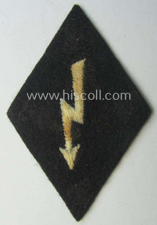 Waffen-SS-pattern, machine-embroidered and black-coloured sleeve-insignia (ie. 'Ärmelraute') depicting a: 'Signalblitz' ('SS-Nachrichten-Trpn.')