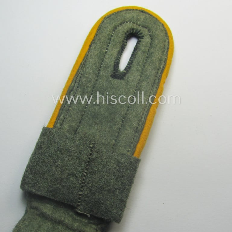 Single, WH (Heeres) NCO-type shoulderstrap that came with its period-attached 'Schulterstückübershube' as was intenden for an: 'Unterwachtmeister des Div.-Kavallerie- o. Aufklärungs-Abtlgs. 246'