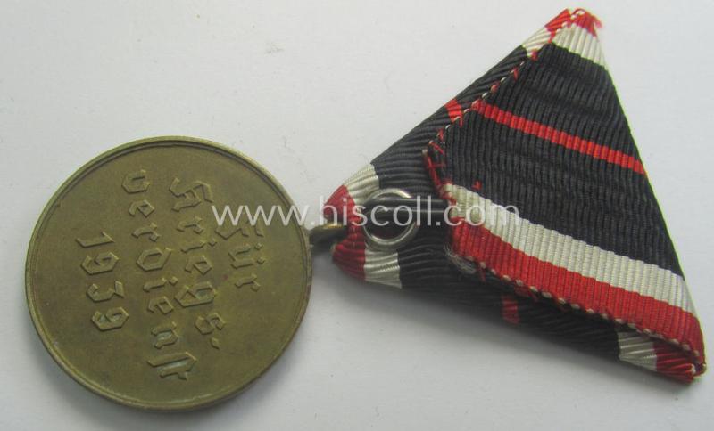 Medal-set: 'Kriegsverdienstmedaille 1939' being a (typical) non-maker-marked- (and 'Buntmetall'-based) specimen that came mounted onto its (scarcely seen!) bright-red-coloured- and/or Austrian-styled ribbon (ie. 'Bandabschnitt')