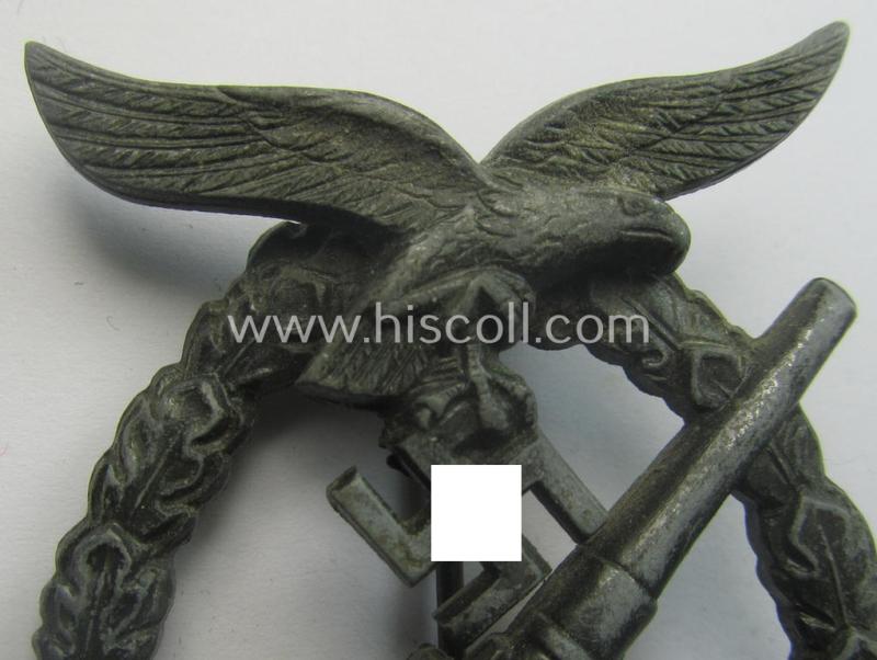 Later-war period- and/or: zinc- (ie. 'Feinzink'-) based- example of a maker- (ie. 'WH'-) marked, WH (Luftwaffe) 'Flakkampfabzeichen' (or: airforce anti-aircraft badge), as was produced by the desirable: 'Wilhelm Hobacher'-company