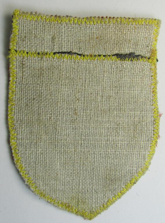 Superb - and truly rarely seen! - locally produced(!), 'Waffen-SS'-type armshield as (partly) executed in the so-called: 'semi-BeVo'-pattern entitled: 'Latvia' as was merely intended for usage by the members of the: 'Latvian Legion'