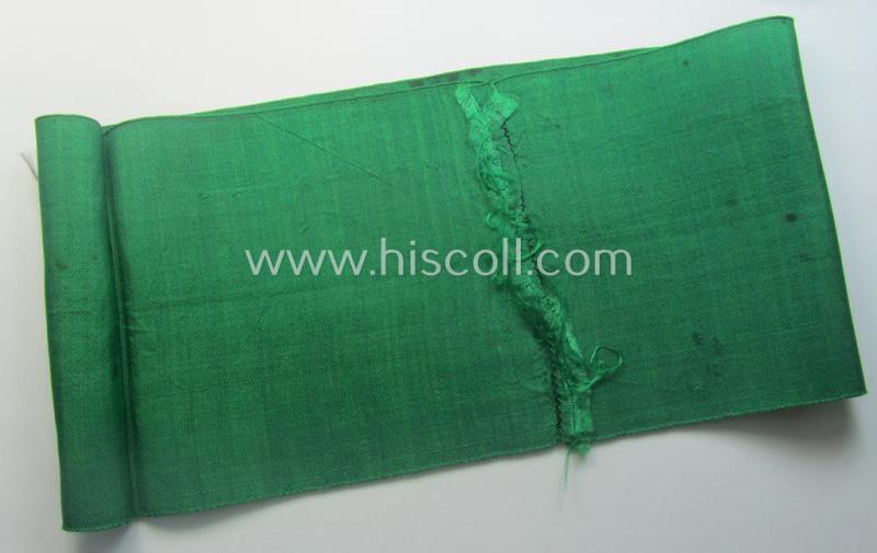 DRB- (ie. 'Deutsche Reichsbahn'-) related armband entitled: 'Reichsbahn' being of the 'entirely-woven'-type onto (typical) silk-like cloth in a technique similar to the 'BeVo'-weave pattern