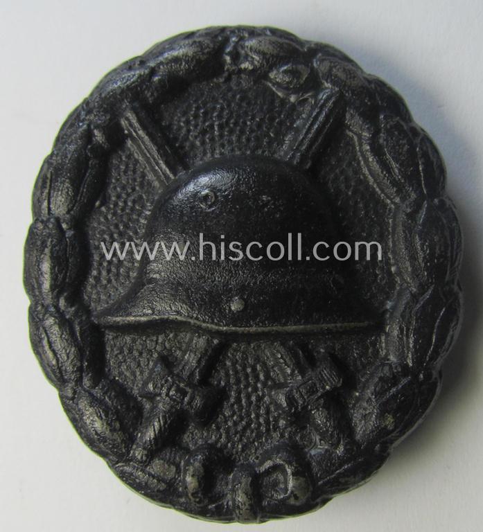 WWI-pattern, black-class wound-badge (ie.: 'Verwundeten Abzeichen in Schwarz') being a very detailed (and magnetic) example that comes in a just minimally used- ie. worn, condition