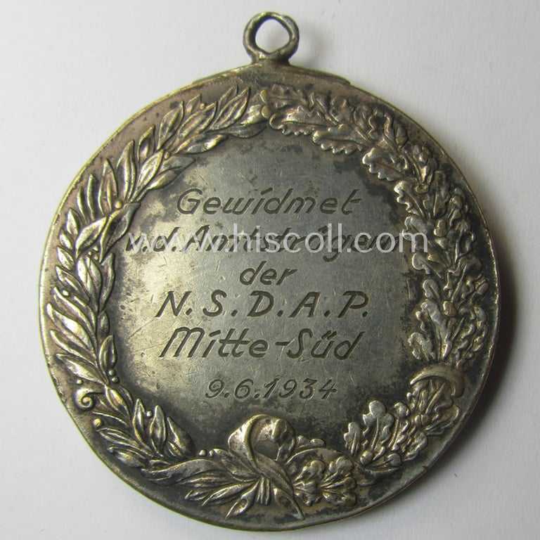 Never before seen, TR-period commemorative-medal (ie. 'Erinnerungs- o. tragbare Medaille') showing a portrait of AH and bearing on its back the engraved text: 'Gewidmet v.d. Amtsträger der N.S.D.A.P. - Mitte Süd - 9-6-1934'