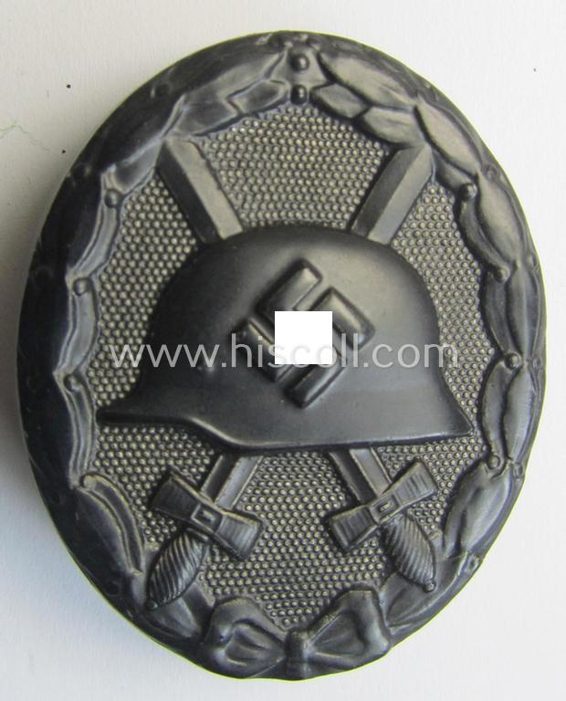 Superb - and clearly maker- (ie. 'E.S.P.'-) marked! - example of a black-class wound-badge (or: 'Verwundeten-Abzeichen in Schwarz') as being produced by the (unusually seen!) maker (ie. 'Hersteller'): 'Eugen Schmidthausser' (ie. 'E.S.P.')