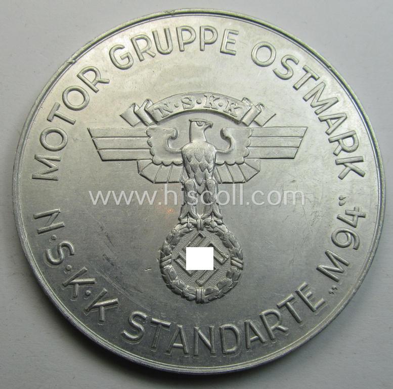 Superb, aluminium-based commemorative N.S.K.K.-related plaque (ie. 'Erinnerungs- o. nichttragbare Auszeichnungsplakette') showing an illustration of an N.S.K.K.-trooper and text: '17. Zuverlässigkeitsfahrt Rund um Wien 1939'