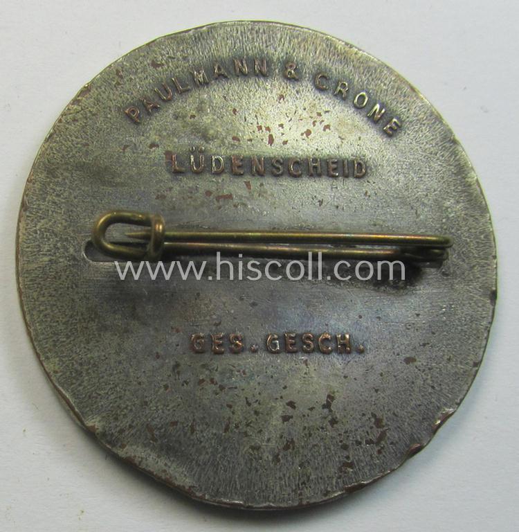 Commemorative, silvered 'Buntmetall'-based N.S.D.A.P.- (ie. WHW-) related 'tinnie' being a maker- (ie. 'Paulmann u. Crone'-) marked example depicting A.Hitler and text: 'Hitler's Dank - Winterhilfe 1933-1934 - Gau Westfalen-Nord'