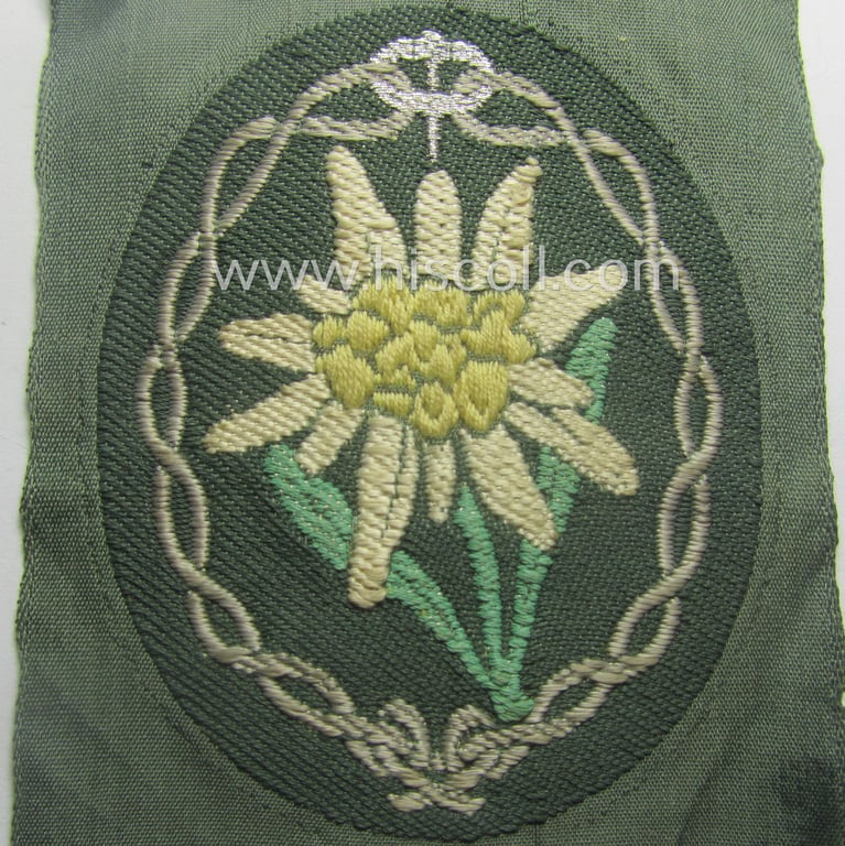'Variant'- (ie. first!-) pattern, WH (Heeres) 'Gebirgsjäger'- (ie. mountain-troopers-) related arm-badge, being a desirable example as was executed in the 'BeVo'-weave pattern on a field-grey-coloured background