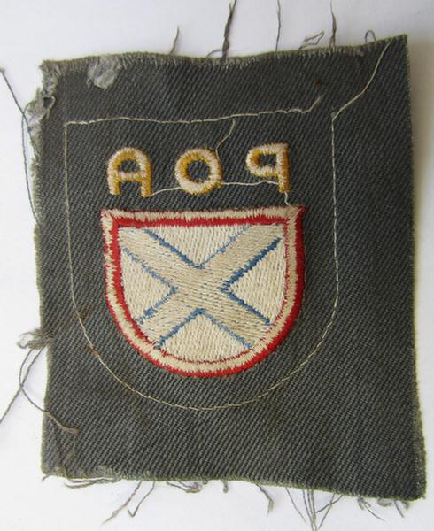 Very nice - and actually scarcely encountered! - multi-coloured and machine-embroidered- (ie. 'variant'-type) armshield as was intended for a Russian volunteer of the 'Russian Liberation Army' (ie. 'POA')
