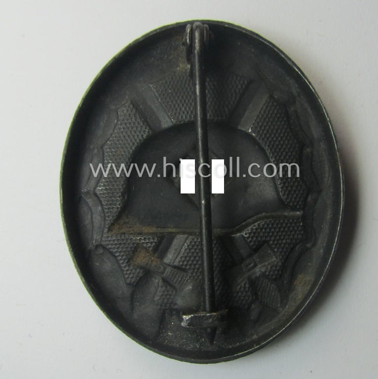 Neat - albeit non-maker-marked and magnetic! - example of a black-class wound-badge (or: 'Verwundeten-Abzeichen in Schwarz') that comes in an overall nice- (ie. I deem just minimally used-), condition