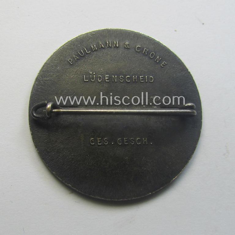 Commemorative - zinc-based- and/or silver-coloured - N.S.D.A.P.- (ie. WHW-) related 'tinnie', being a maker- (ie. 'Paulmann u. Crone'-) marked example depicting a portrait of Adolf Hitler surrounded by the text: 'Hitlers' Dank - Gau Westfalen N...