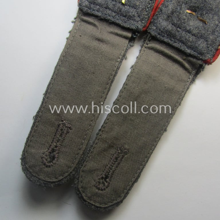 Fully matching - and rarely seen! - pair of neatly 'cyphered', WH (Luftwaffe) NCO-type shoulderstraps as piped in the bright-red-coloured branchcolour as was intended for a: 'Wachtmeister einer Luftwaffen-Waffenschule'