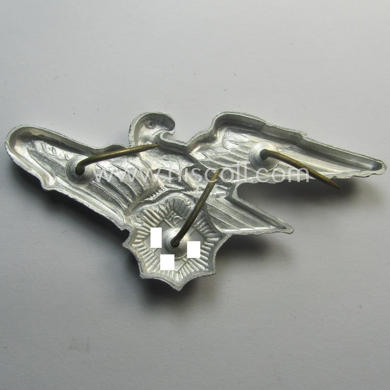 Officers'- (ie. evt. NCO-) pattern, aluminium-based so-called: 'Luftschutz' (ie. RLB-) visor-cap eagle being a maker- (ie. 'HA'-) marked example as was produced by the 'H. Aurich'-company