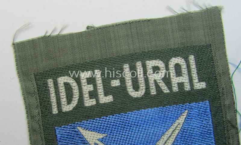 Attractive - multi-coloured- and 'BeVo'-woven - armshield (ie. 'Ärmelschild') entitled: 'Idel-Ural' as was intended for usage by a volunteer serving within the 'Volga-Tartar Legion') and that comes in a 'virtually mint- ie. unissued', condi...