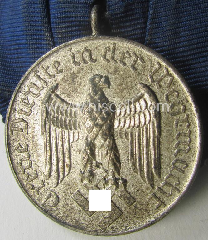 WH (Heeres- o. KM) so-called: 'Einzelspange' showing a: 'WH-Dienstauszeichnung 4. Stufe' (as was intended for 4 years of loyal-service) and that shows a detailed, 'Heeres'-type-eagle-device, period-attached