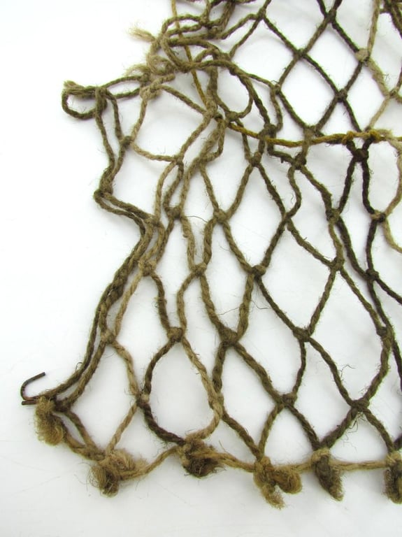 Complete late war German helmet net with attachment hooks