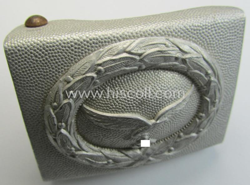 Superb, WH (Luftwaffe) 'standard'-pattern, aluminium-based (dress- ie. 'Ausgeh'-pattern) belt-buckle (ie. 'Koppelschloss für Mannschaften u. Uffz. der LW') being a typical non-maker-marked example that comes in a wonderful condition