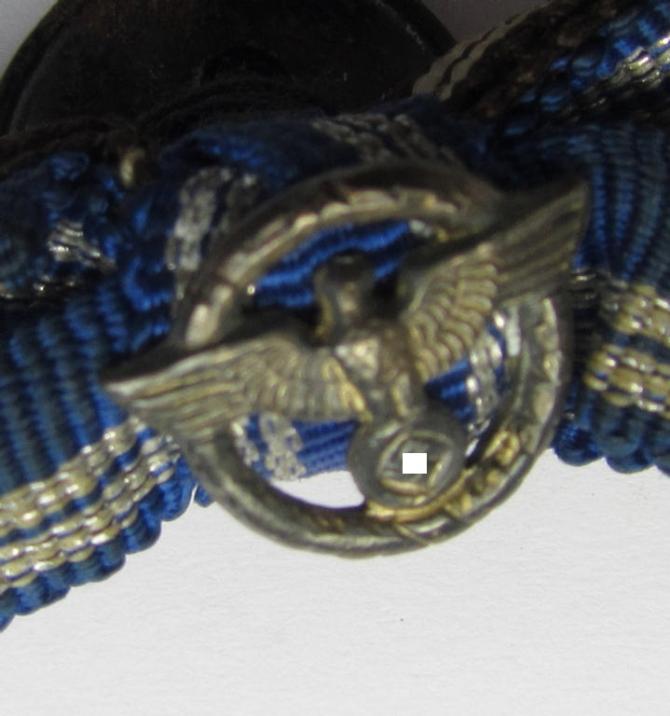 Two-pieced N.S.D.A.P-related ribbon-bar (ie. 'Feld-/Bandspange') that comes on its specific 'button-hole'-set-up, showing resp. the ribbons for two: 'N.S.D.A.P.-Dienstauszeichnungen der 2. u. 3. Stufe'
