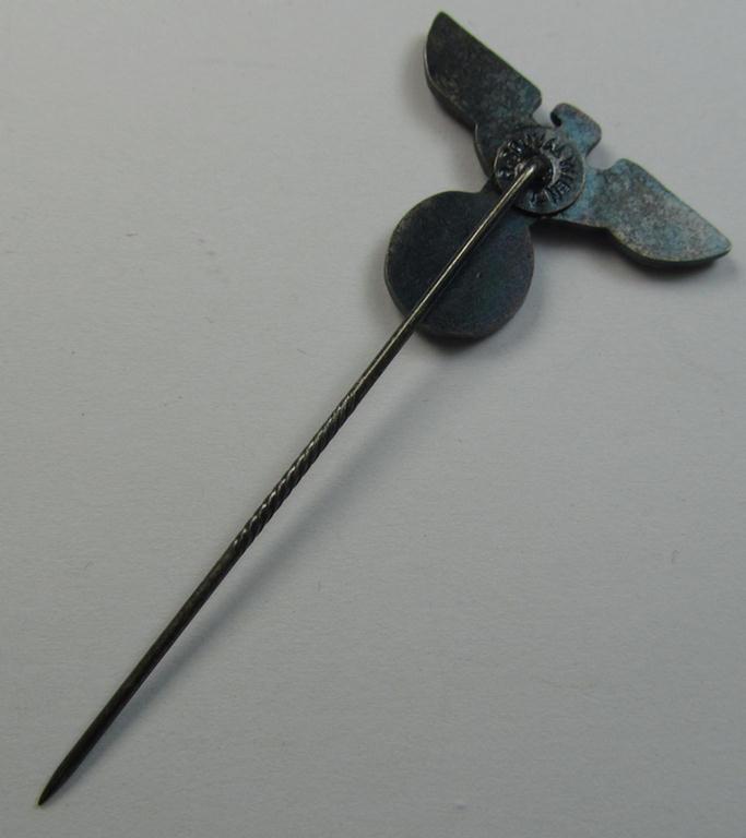 Silverish-coloured - and truly very detailed! - so-called: 'N.S.D.A.P.'-supporter- (ie. membership-) lapel-pin (ie. 'tie'-pin) being a maker- (ie. 'R. Souval'-) marked example showing a pronounced 'Reichsadler'-device