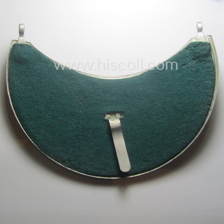Superb - quite rarely seen and very detailed! - aluminium-based, N.S.K.K.-related gorget (ie. 'Brustschild o. Ringkragen') depicting the typical N.S.K.K.-eagle-device, unique numeral: '13074' and text that reads: 'N.S.K.K. Verkehrserziehungsdienst'