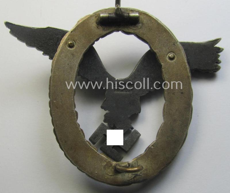 Early- (ie. pre-) war-period- and/or: 'Buntmetall'- (ie. 'Tombak'-) based: WH (Luftwaffe) 'Flugzeugführerabzeichen' (or: pilots-badge) being a maker- (ie. 'C.E. Juncker'-) marked example of the 'J2'-pattern