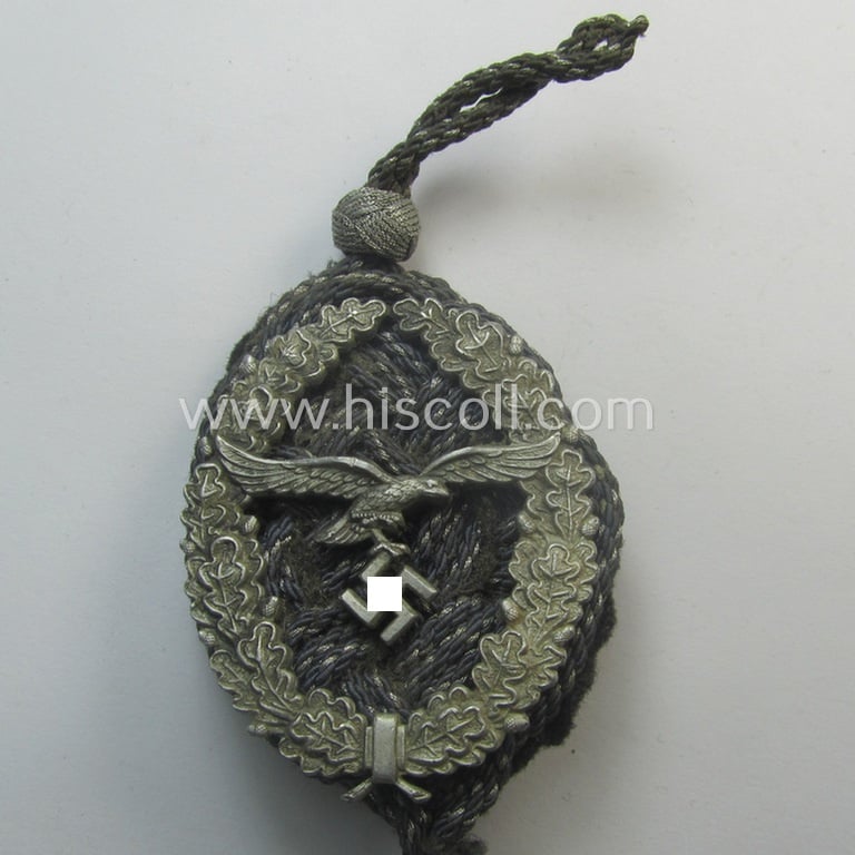 WH (Luftwaffe) 'Schützenschnur' (ie. shooting-lanyard) being an example of the lowest- (ie. third) grade (ie. 'Luftwaffe Schützenschnur der 3. Stufe für Gewehrschutzen')
