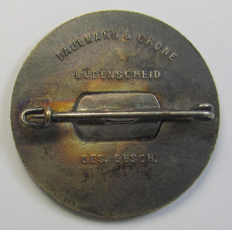 Commemorative, silvered 'Buntmetall'-based N.S.D.A.P.- (ie. WHW-) related 'tinnie' being a maker- (ie. 'Paulmann u. Crone'-) marked example depicting A.Hitler and text: 'Hitlers' Dank für den Dienst am Volke - Gau Süd-Hannover - Braunschweig...