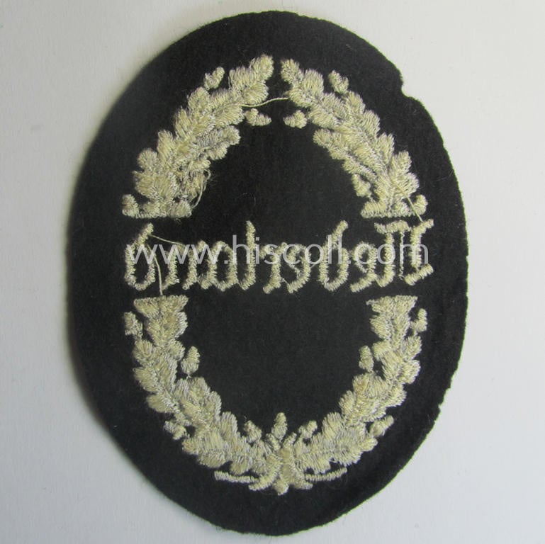 Superb - and exceedingly rarely found! - example of a Dutch SS-related so-called: 'Werkdienst Nederland'-arm-patch